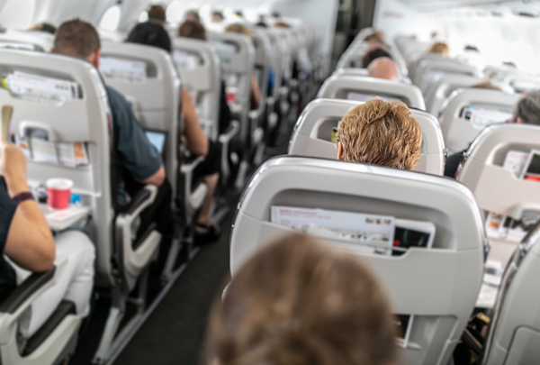 Crowded commercial airliner.