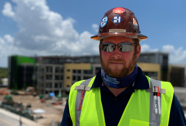 Haskell's Nathan Faloon standing on a jobsite.