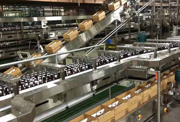 Bottles and boxes on packaging line.