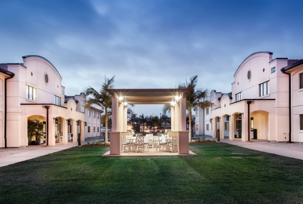 Miramar Inn lawn and picnic area at dusk