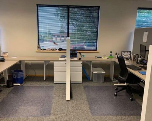 Shared cubicle in the Beloit office